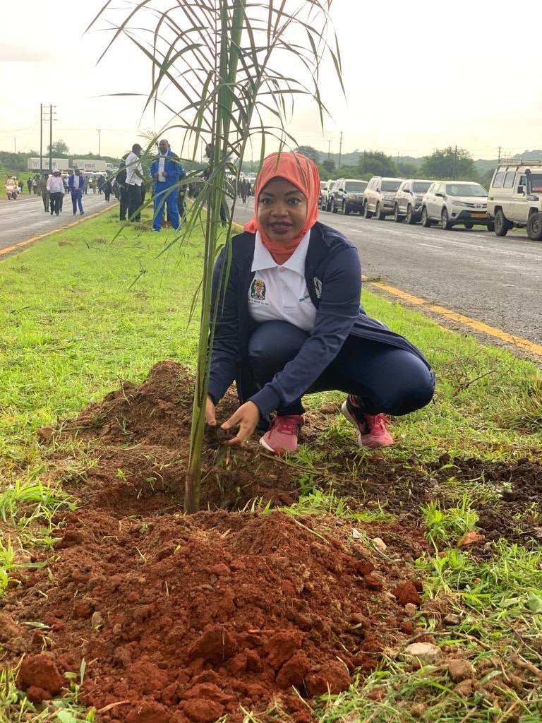 Tanzanian community members working together in a sustainable garden